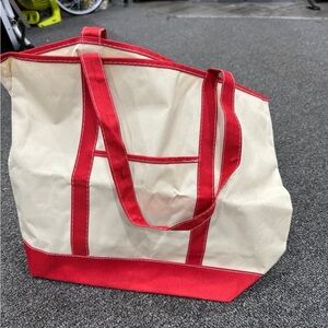 Red and tan tote bag